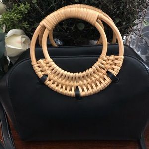 Elegant Black Crossbody Bag with Woven Handle